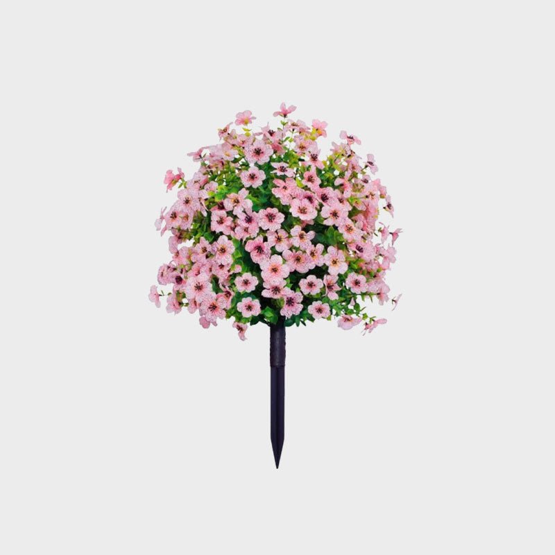 Decoração floral artificial de eucalipto e violeta para inserção no solo.