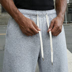 📢📢60% de desconto!! ⏰👖Calças casuais masculinas folgadas com cordão na cintura