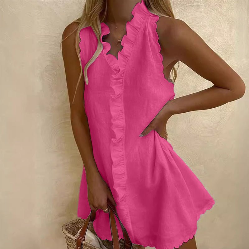 Short-sleeved dress with ruffle and tie details at the front.